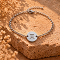 Silver chain bracelet with round Gemini II charm