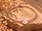 Rose gold-tone chain bracelet with round smooth disc charm