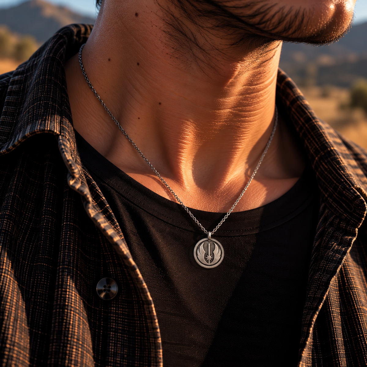 Jedi Order medallion necklace with round silver pendant and chain at the collar